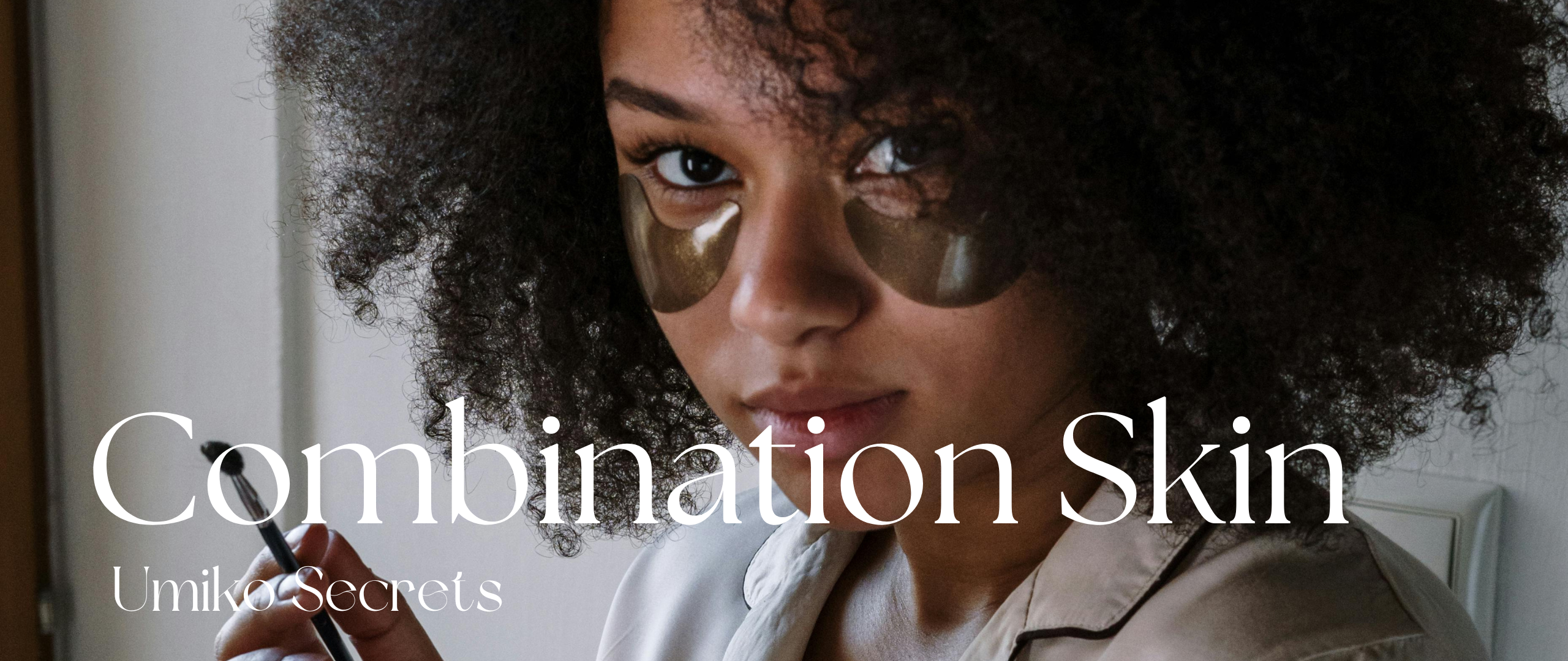 A black girl with eye pads.